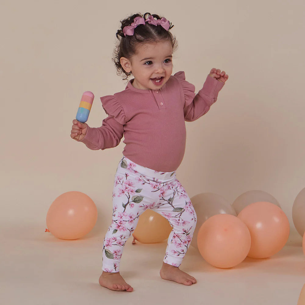 Jewel Pink Rib Long Sleeve Organic Bodysuit with Frill